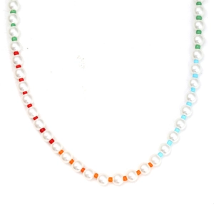 Detail view of handmade pearl necklace with colorful beads and evil eye pendant detail