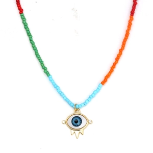 Detail of multi-colored seed bead necklace featuring a gold Evil Eye charm with blue accents