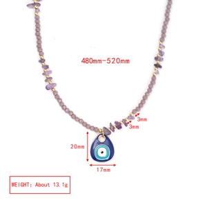 Detailed view of evil eye necklace with purple beads and dimensions marking for size