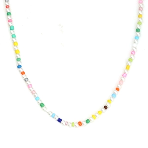 Close-up of colorful beaded necklace with white pearls and vibrant evil eye accents