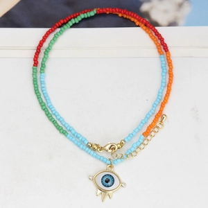 Colorful seed bead evil eye necklace with gold extension chain and lobster clasp