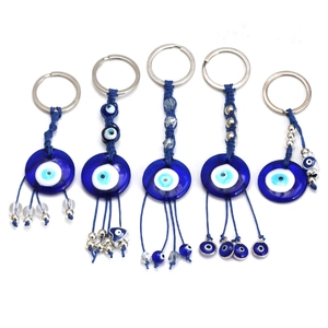 Set di cinque portachiavi Evil Eye in vetro con corde blu e anelli in argento