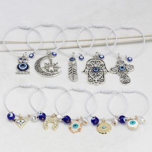 Blaues Evil Eye Anhänger Charms mit weißen Stahlseil Armbändern und Talisman Elementen