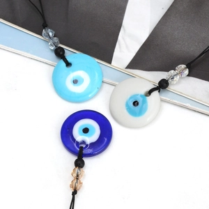 Blauwe Evil Eye kettingset met zwart koord, kristallen kralen en glazen hangers