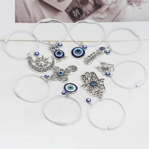 9-teiliges Armband-Set mit Evil Eye, Hamsa-Hand und Eule an weißen Stahldrähten