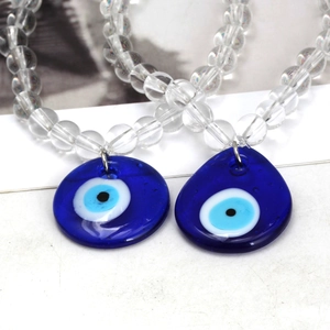 Blue glass evil eye beaded pendant necklace set with water drop and round charms