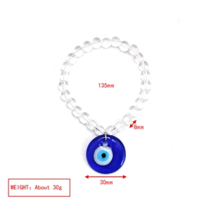 Detail view of Evil Eye beaded bracelet with 30mm glass pendant and 8mm round beads