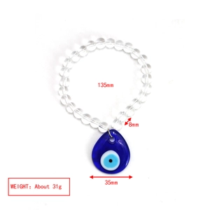 Detail view of Evil Eye beaded bracelet showing dimensions: 135mm length and 35mm pendant