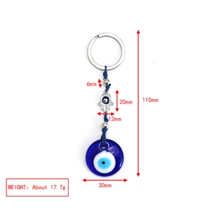 Dettaglio dell'occhio blu in vetro e mano di Hamsa con misure dimensionali