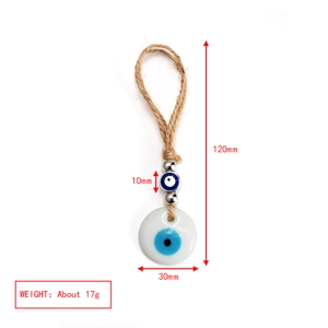 Detailed view of handmade Nazar evil eye pendant with brown rope and metal beads