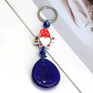 Christmas gnome evil eye keychain with red hat and blue drop pendant on silver ring