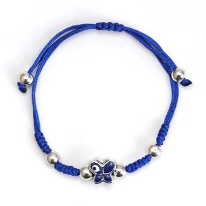 Close-up of blue braided cord bracelet with silver beads and Evil Eye butterfly charm