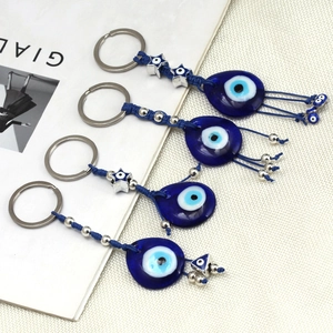 Portachiavi occhio di Allah blu in vetro con corda intrecciata e ciondoli d'argento