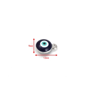 Detail view of 12mm evil eye pendant with blue enamel inlay and silver circular frame