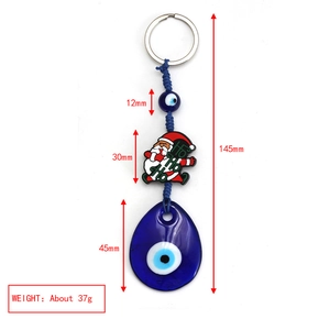 Christmas Evil Eye keychain dimensions showing 145mm length and Santa Claus detail