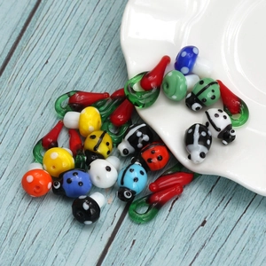 Colorful glass beads set with mushroom, ladybug and chili shapes for DIY jewelry making