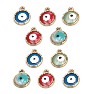 Close-up of multicolored evil eye charms in gold frames for DIY jewelry making
