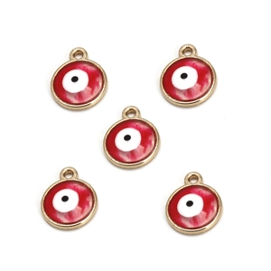 Detailed view of five red enamel evil eye charms with golden metal rims for DIY jewelry