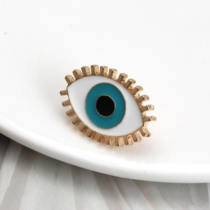 Evil eye alloy brooch with crystal accents in gold finish for clothing accessory