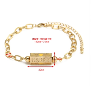Close-up of gold chain bracelet with engraved Happy bead and size measurements