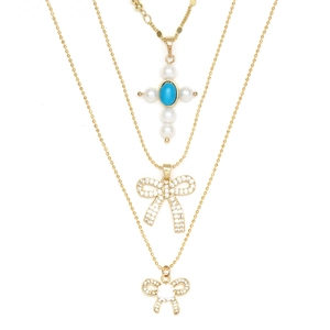 Luxueux Collier Pendentif Nœud en Cuivre Doré Croix de Zirconium Imitation Künstliche Perle Chaîne à Billes Bijoux Pour Femmes Fête