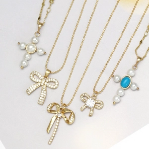 Colliers réglables en perles dorées avec pendentifs nœud en zircon et œil protecteur