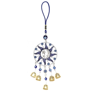 Golden sun and moon bell keychain with blue evil eye beads on white background