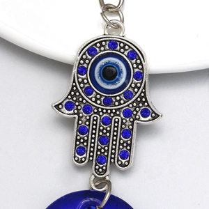 Turkish Evil Eye Hamsa Hand keychain with blue rhinestones and glass pendant charm