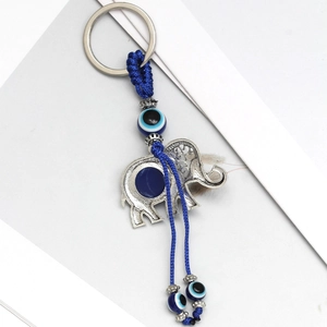 Elephant evil eye keychain with blue braided rope and silver metal animal pendant charms