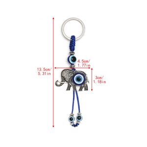 Detail view of evil eye elephant keychain with blue cord showing 13.5cm total length