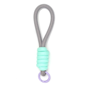 Detail of grey braided cord phone lanyard with mint green wrap and purple spring hook