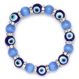 Detail of blue evil eye beads and shimmering cat eye stones on an elastic bracelet