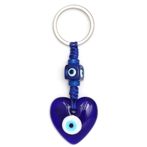 Detail of blue heart-shaped Evil Eye keychain with woven rope and silver metal ring