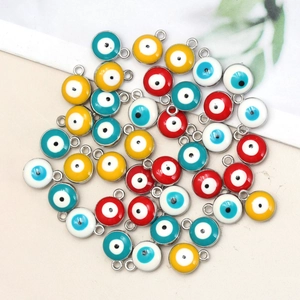 Macro view of colorful enamel evil eye charms for DIY jewelry and necklaces
