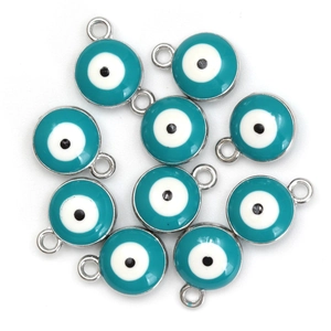 Detailed macro view of enamel blue evil eye alloy pendants for DIY necklace jewelry making