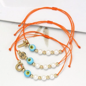 Dreiteiliges orangefarbenes Evil Eye Armband Set mit goldenem Kreuz und Hufeisen Anhänger
