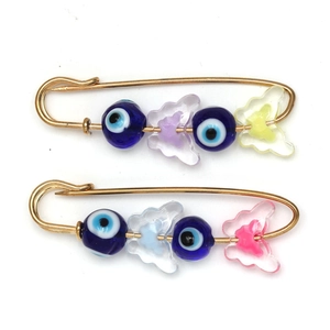 Golden evil eye safety pin brooch with colorful glass butterflies and blue beads