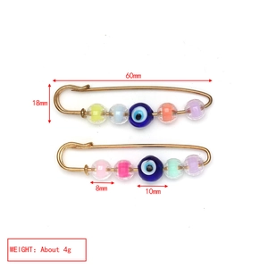 Detailed size specifications of 60mm evil eye brooch with colorful candy beads