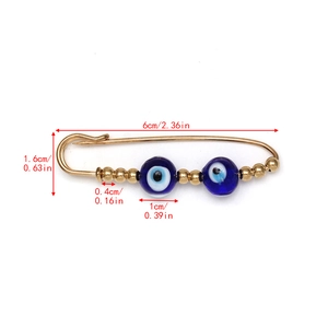 Detailed size chart for the Evil Eye safety pin brooch with blue beads and measurements