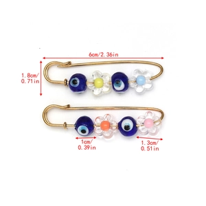 Detailed view showing dimensions of Evil Eye safety pin brooch with floral beads