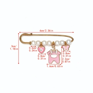 Spécifications de taille pour broche œil de protection rose avec perles et breloques