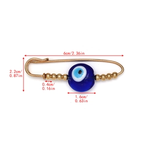 Detailed size view of Evil Eye safety pin brooch with 1.6cm blue bead and 6cm length
