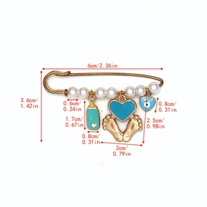 Dimensions détaillées de la broche épingle dorée avec perles et breloques œil bleu