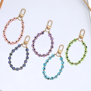 Handmade beaded evil eye charms in five colors with gold lobster clasps for car and home decor