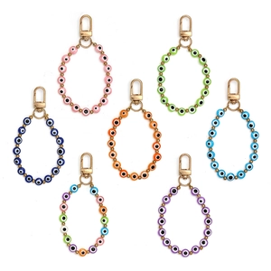 Set of seven colorful evil eye beads pendants with golden lobster clasps for home or car decor