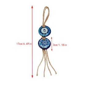 Detailed view of evil eye hanging ornament showing 17cm length and 3cm bead size