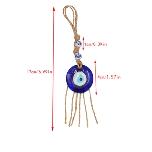 Detail showing the Evil Eye glass pendant with rope tassel and dimensions at 17cm