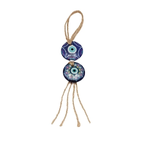 Macro detail of Evil Eye and Mandala painted beads with rustic hemp rope and tassels