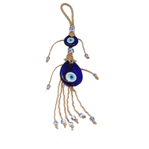 Detail of Turkish Evil Eye wall hanging with glass pendants, hemp rope and ceramic beads