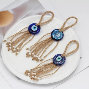 Three-piece Nazar Evil Eye wall hanging set with jute rope and white bead tassels
